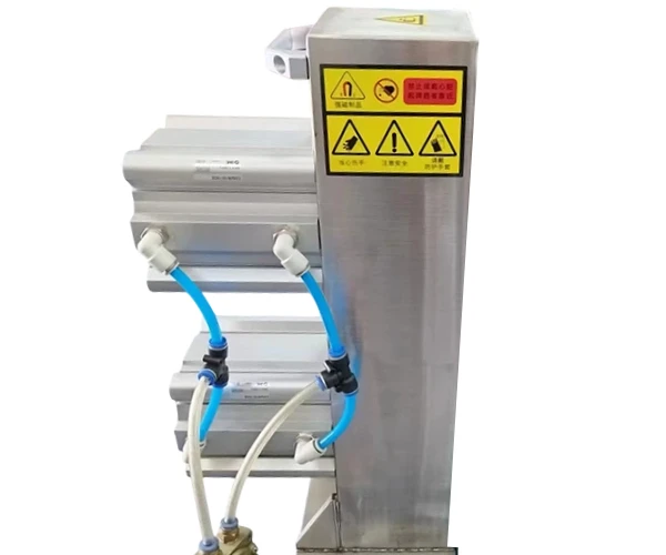 Magnetic sheet separator with warning labels and pneumatic connections Magnetic sheet separator with warning labels and pneumatic connections